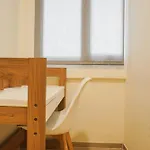 Comfort 1Br With Working Room At Meikarta Apartment By Travelio