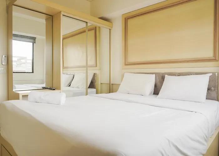 Comfort 1Br With Working Room At Meikarta Apartment By Travelio